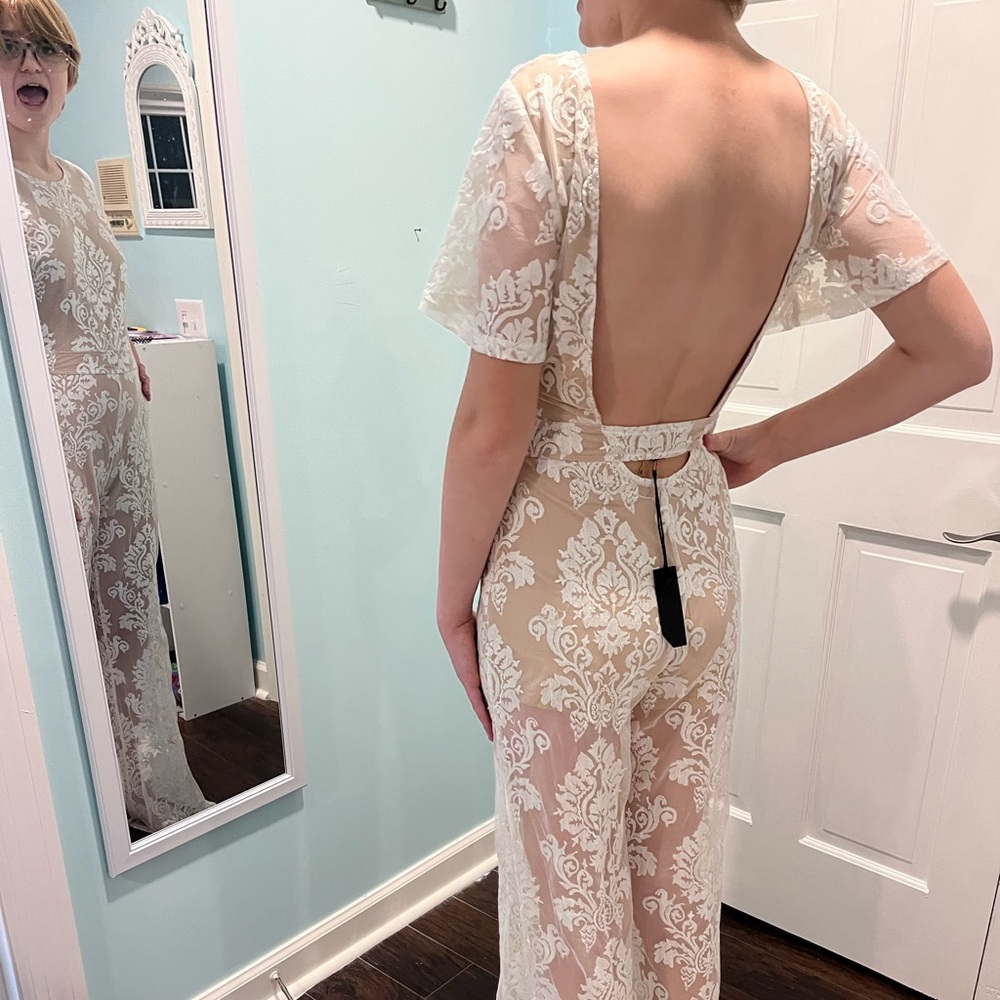 Beautiful lace backless romper NWT